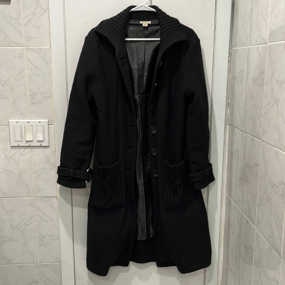 Long black coat with knit detailing